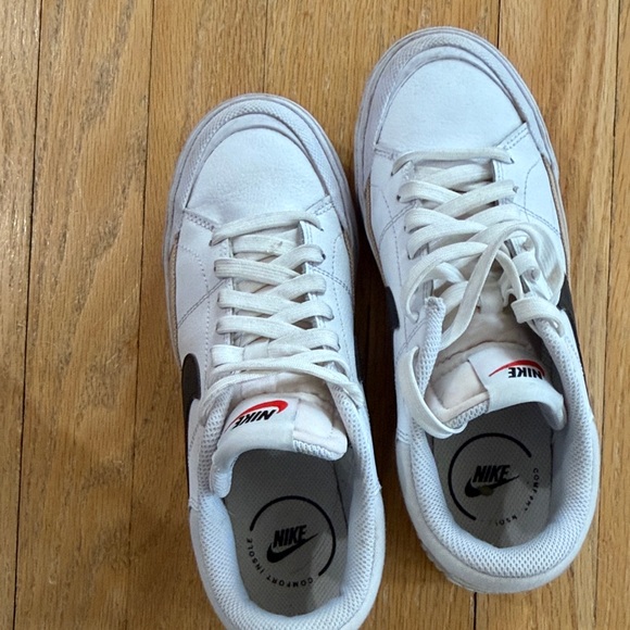 Nike White Low-Top Sneakers with Black Swoosh and Gold Accent - Picture 9 of 15